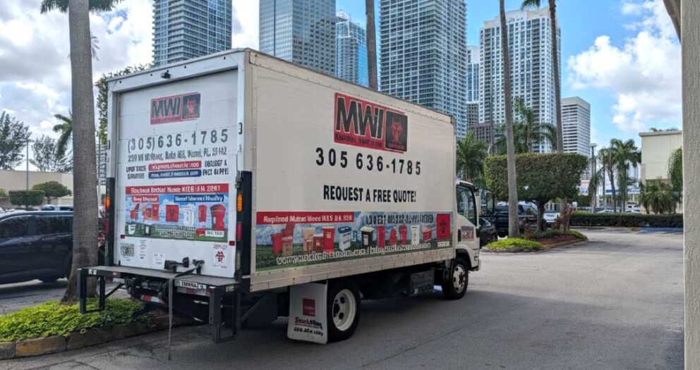 Digitally edited MWI medical waste truck with the Downtown Miami skyscraper skyline as the background